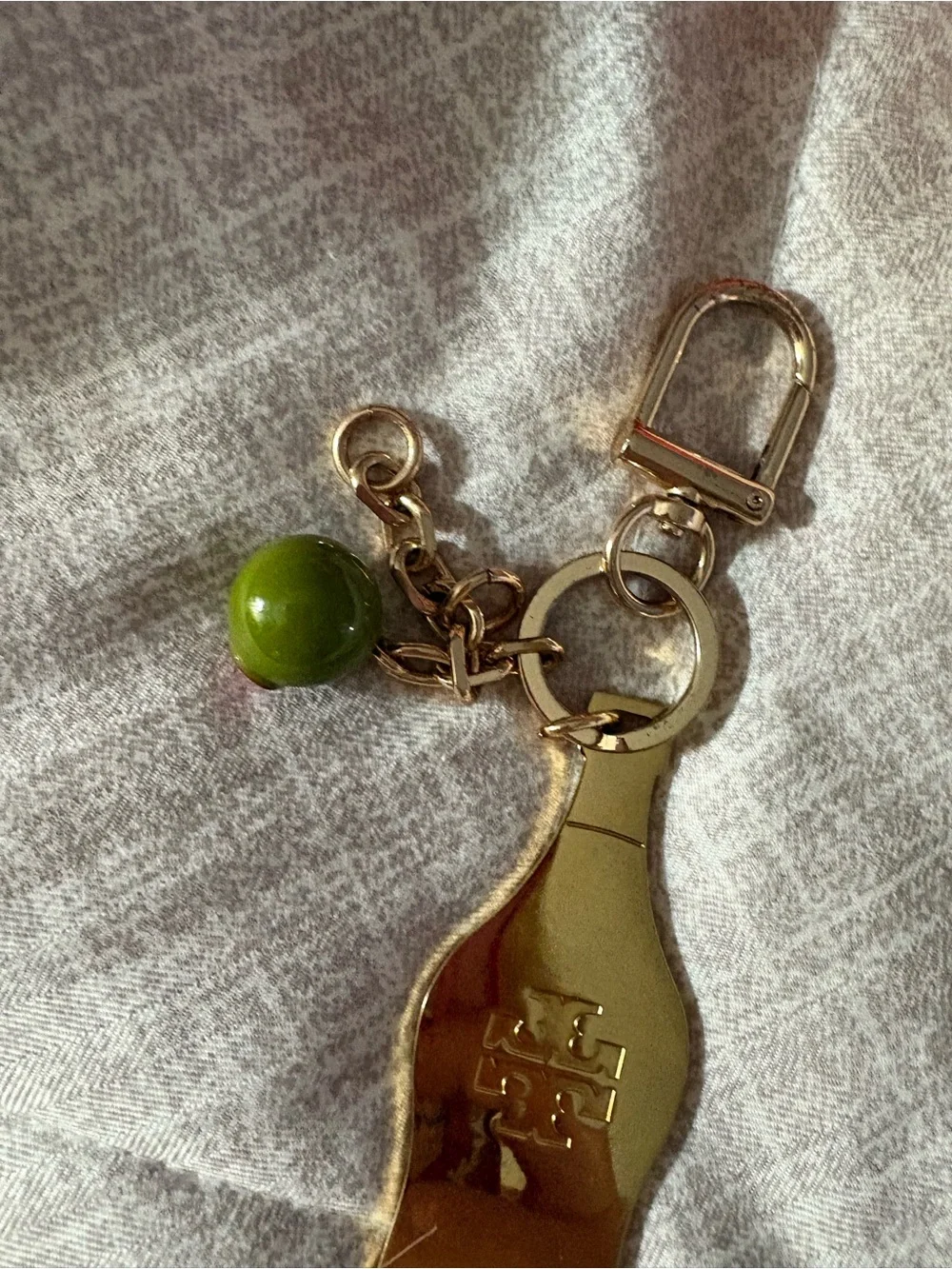 Tory Burch Gold-Tone Bottle Opener Key Holder with Olive Charm